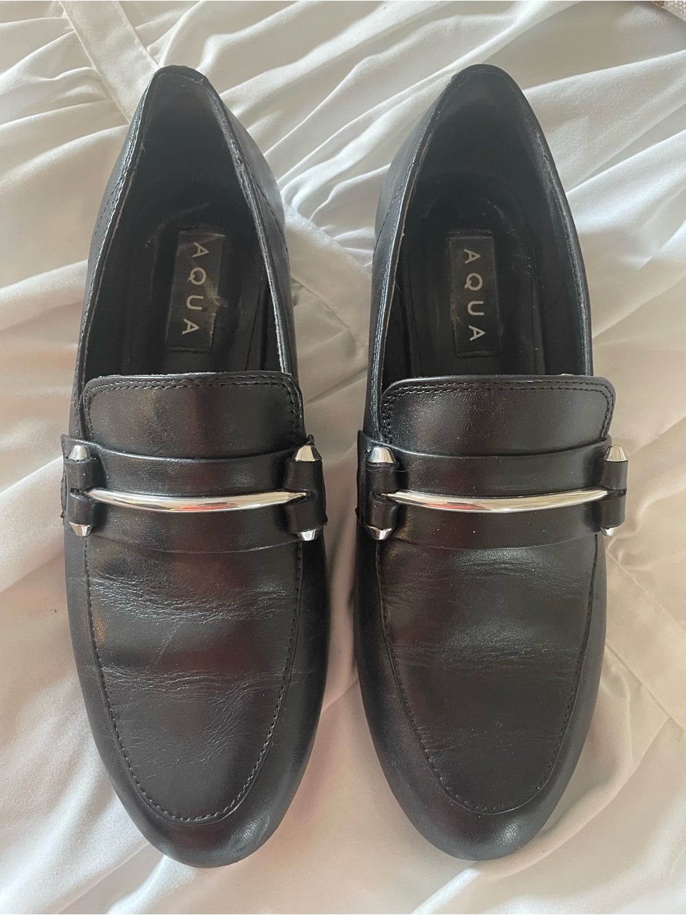 Aqua Brand Black Leather Slip-On Loafers with Silver Bar
